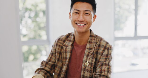 Photo asian business man face and computer planning for digital marketing research data analytics or creative strategy in advertising agency portrait of happy japanese employee working on office desktop