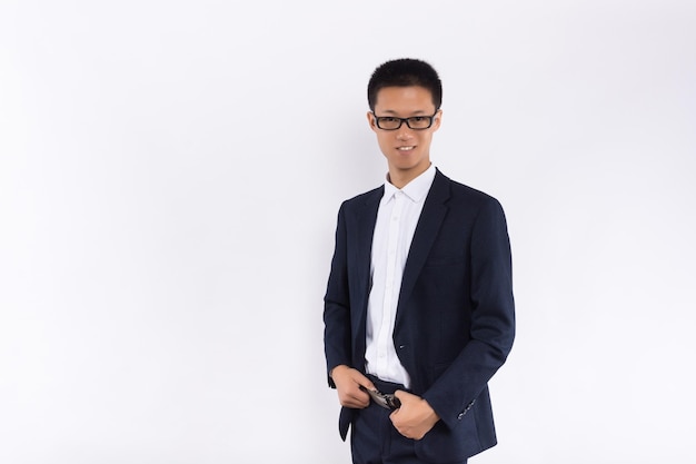 Asian business man standing on white background