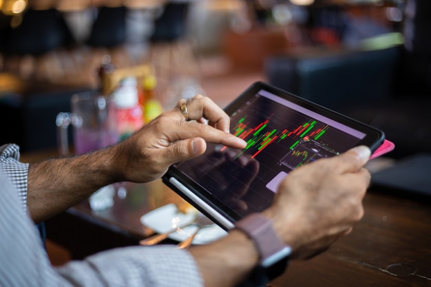 Asian business using tablet for work