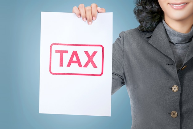 Asian business woman hold paper with tax type