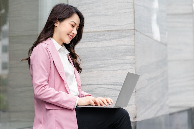 Asian business woman image on the street