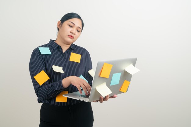 Asian business woman stress from hard work with white\
background