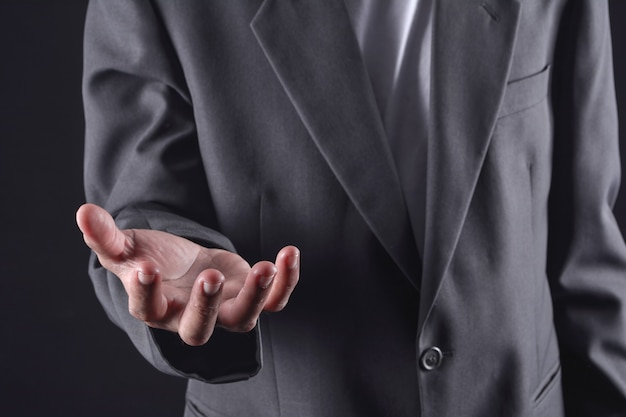 Photo asian businessman. showing his empty hands