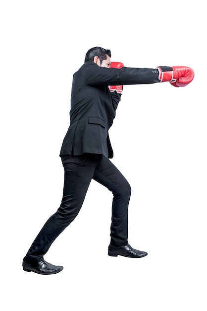 Asian businessman with red boxing gloves fighting