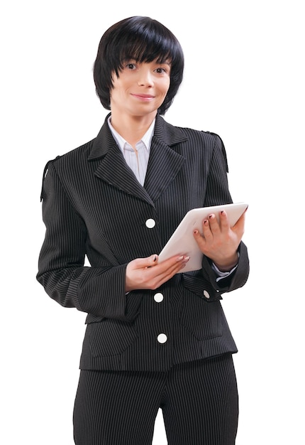 Asian businesswoman hlding white tablet and looking at camera isolated