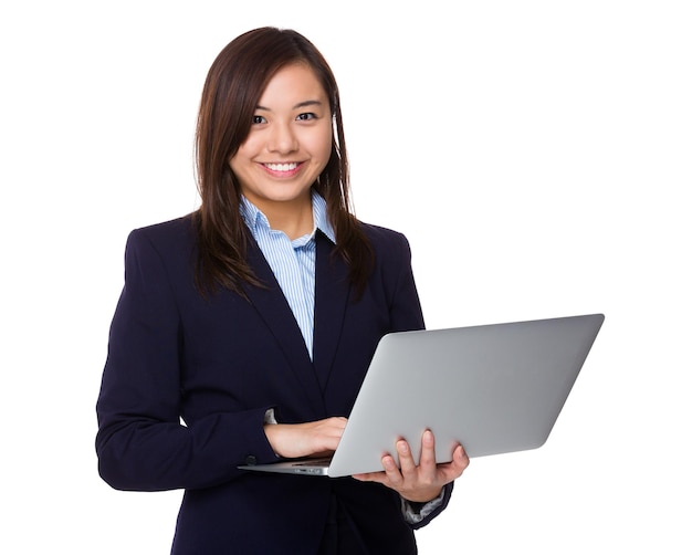 Asian businesswoman use of the notebook computer