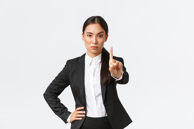 Asian businesswoman on white background.