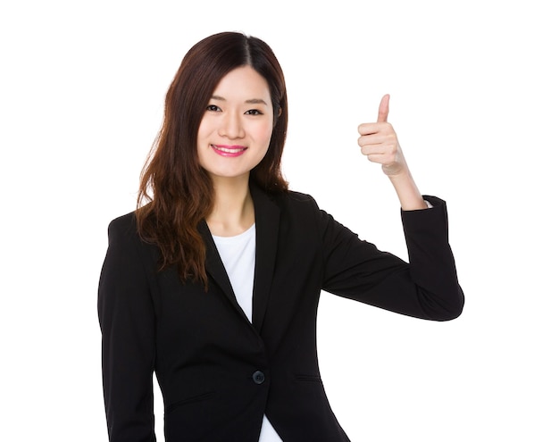 Asian businesswoman with thumb up gesture