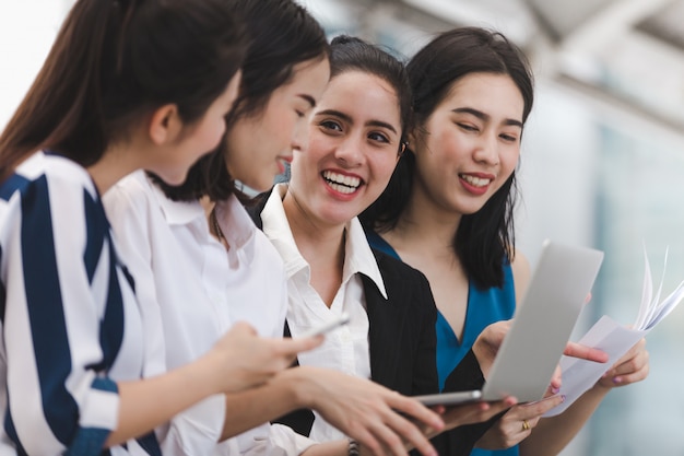 Asian businesswomen group enjoy worker outdoor