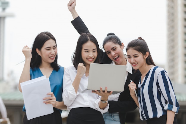 Asian businesswomen group enjoy worker outdoor