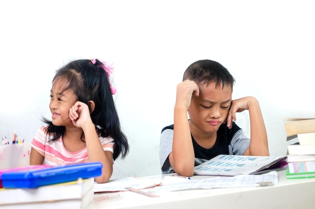 Asian children doing homework