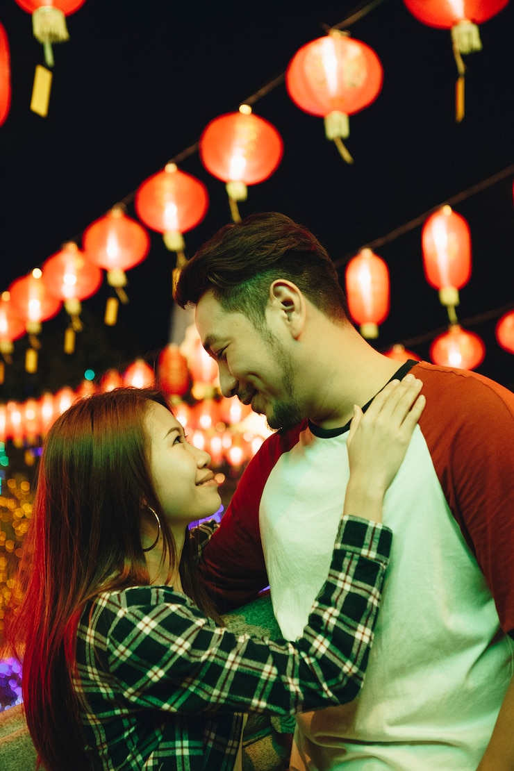 Photo 中国の祭りでアジアカップル
