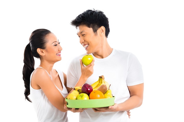 Asian couple eating and living healthy