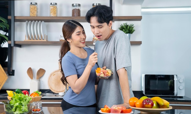 asian couple at kitchen