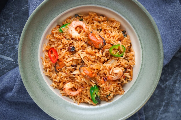 Asian Cuisine,  Nasi goreng, Seafood rice on dark