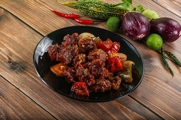 Photo asian cuisine pork with chili sauce