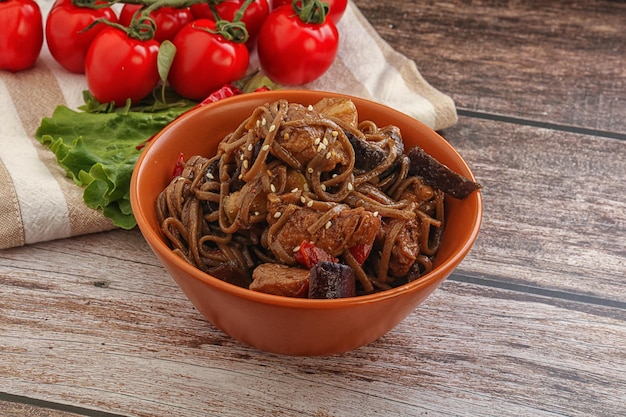 Asian cuisine Udon soba with pork and vegetables