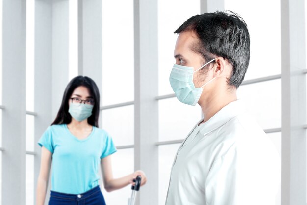 Asian doctor checking woman health before traveling in the hospital. medical check up before traveling