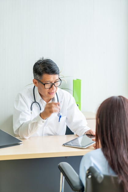 Asian doctor and patient are consultation