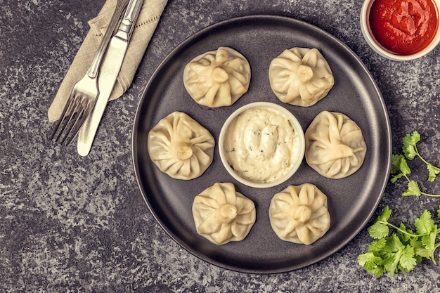 Asian dumplings and white sauce