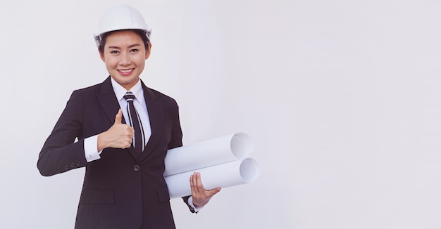 Asian engineer girl show thumbs up on white background