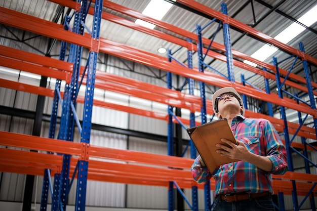 Asian Engineer man working in building factory