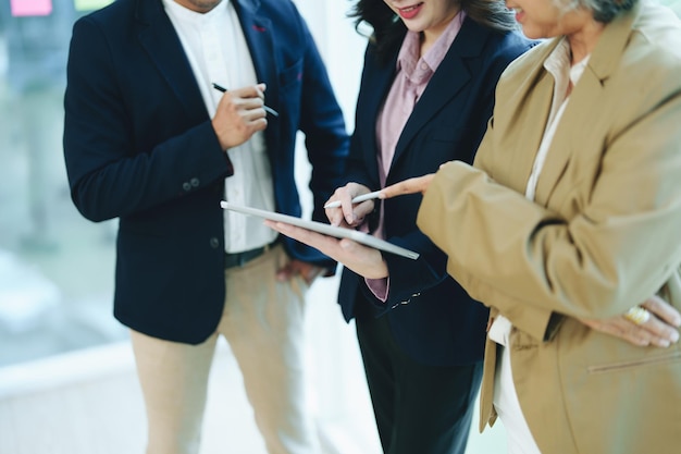 Asian entrepreneurs and business people meeting in a conference\
room in business planning financial budget and investment risk\
assessment to analyze customer groups to increase company\
growth