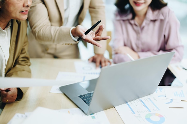 Asian entrepreneurs and business people meeting in a conference room in business planning financial budget and investment risk assessment to analyze customer groups to increase company growth