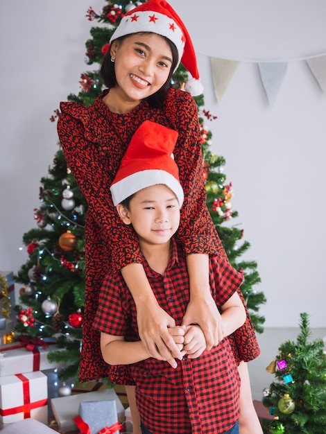 Asian family celebrating Christmas in house