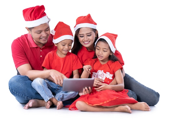 Asian family using a tablet together