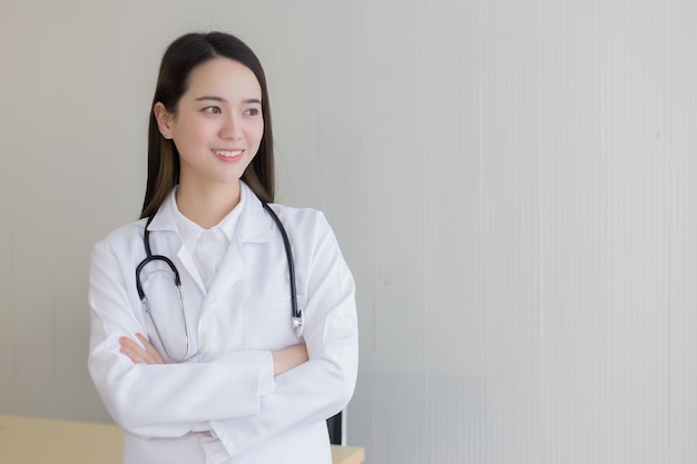 Premium Photo | Asian female doctor with black long hair wears a white lab  coat and stethoscope