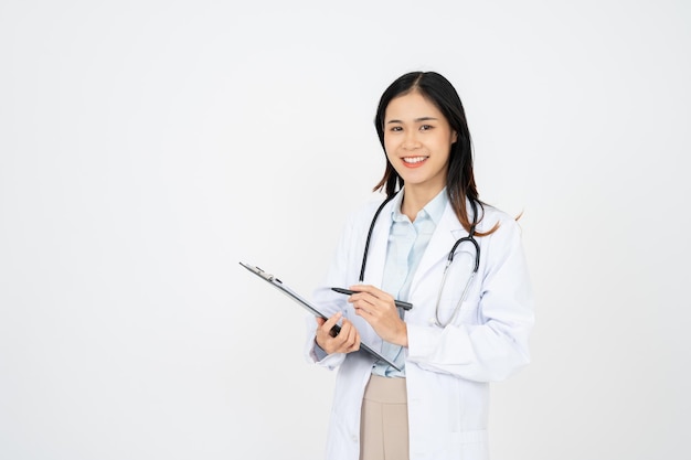 Asian female doctor woman in white medical gown hold clipboard isolated on white background