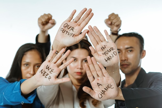 asian female and male students showing written palm