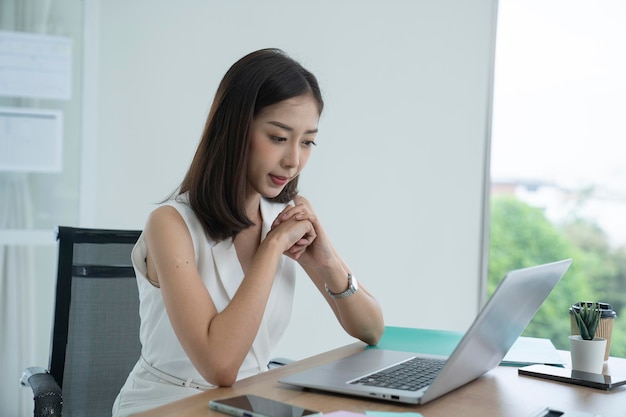 asian female working at office