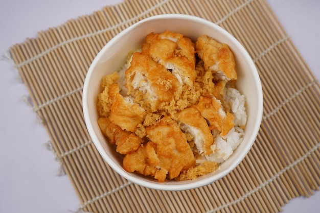 Asian food,  a bowl of rice with delicious meat crunchy and savory