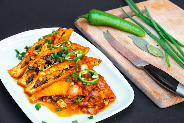 Asian food fried tofu with mushrooms