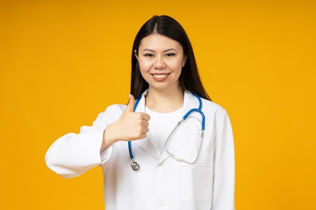 Asian girl doctor in a white coat