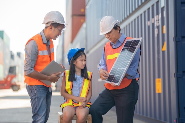 Asian girl learning the technology engineering of renewable solar cell  Engineers Meeting