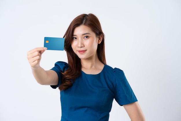 Asian girl portrait in blue dress on white background