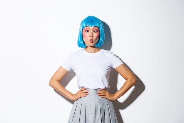 Asian girl wearing a blue short wig