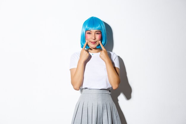 Asian girl wearing a blue short wig