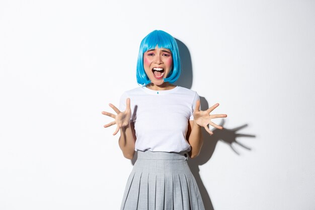 Asian girl wearing a blue short wig