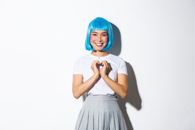 Asian girl wearing a blue short wig