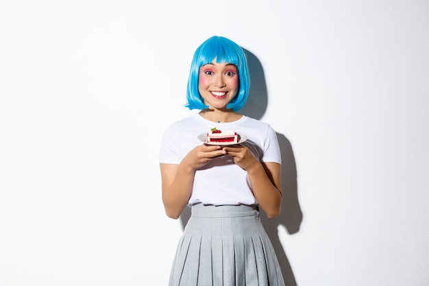 Asian girl wearing a blue wig posing