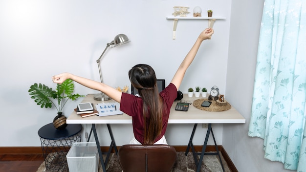 Asian girl working remotely from home