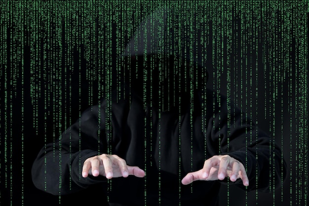 asian hacker in black hood on black backgroundhack passwordhacking safety systems to steal information