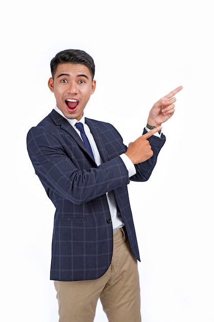 Asian handsome young business man pointing finger