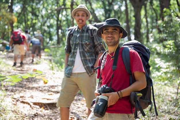 Asian hiker with camera