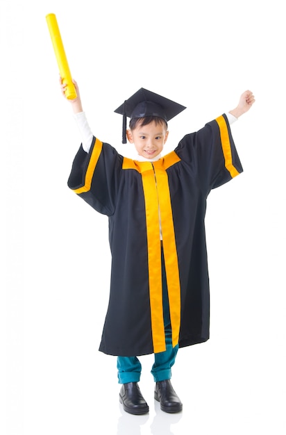 Asian kid in graduation gown