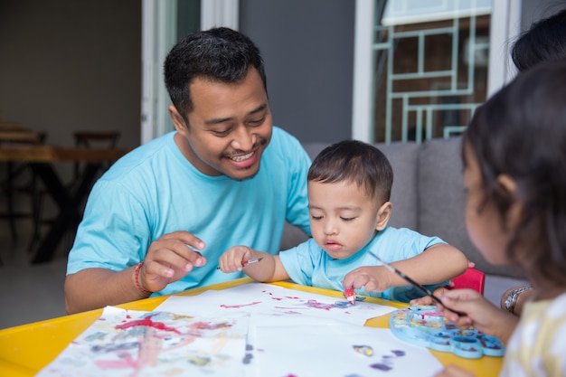 Asian kid painting and drawing